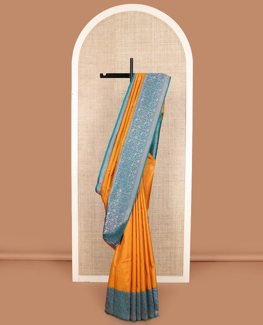 Yellow striped and zari buttas silk saree with contrast vanasingaram border of yaanai, killi, and kodi visiry designs, and jaal pallu
