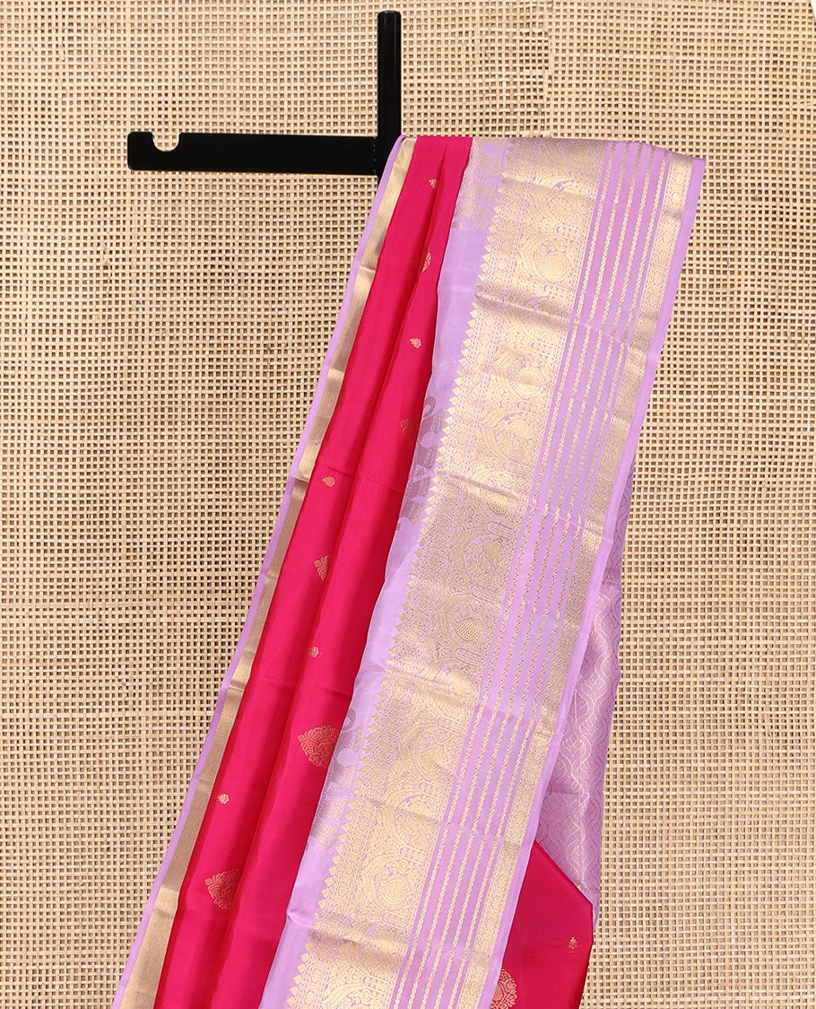 Pink Vasundhara Lite Silk Mix Saree, Adorned with Zari Buttas on Its Body, Complemented by a Contrast Border of Yaanai, Thilakam Mokku, Neli, Mayil, Arumbu Manga, and Kamalam Designs, Grand Ogee-Patterned Pallu, and Paired with a Contrast Blouse