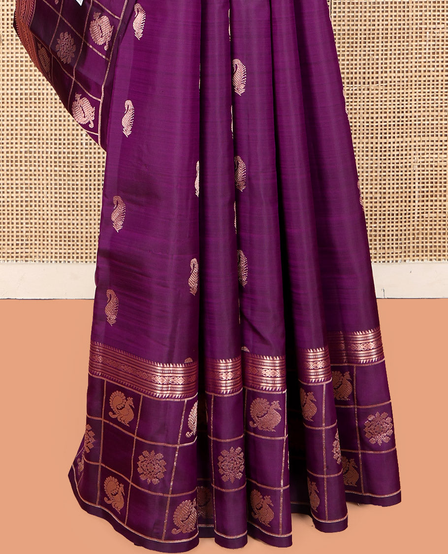 Purple Vasundhara Silk Saree, Artfully Detailed with Zari Buttas, Highlighted by a Zari Border of Rekku, Muthu, Jada Nagam, and Butta Enclosed Checks, Jaal Pallu, and a Matching Blouse