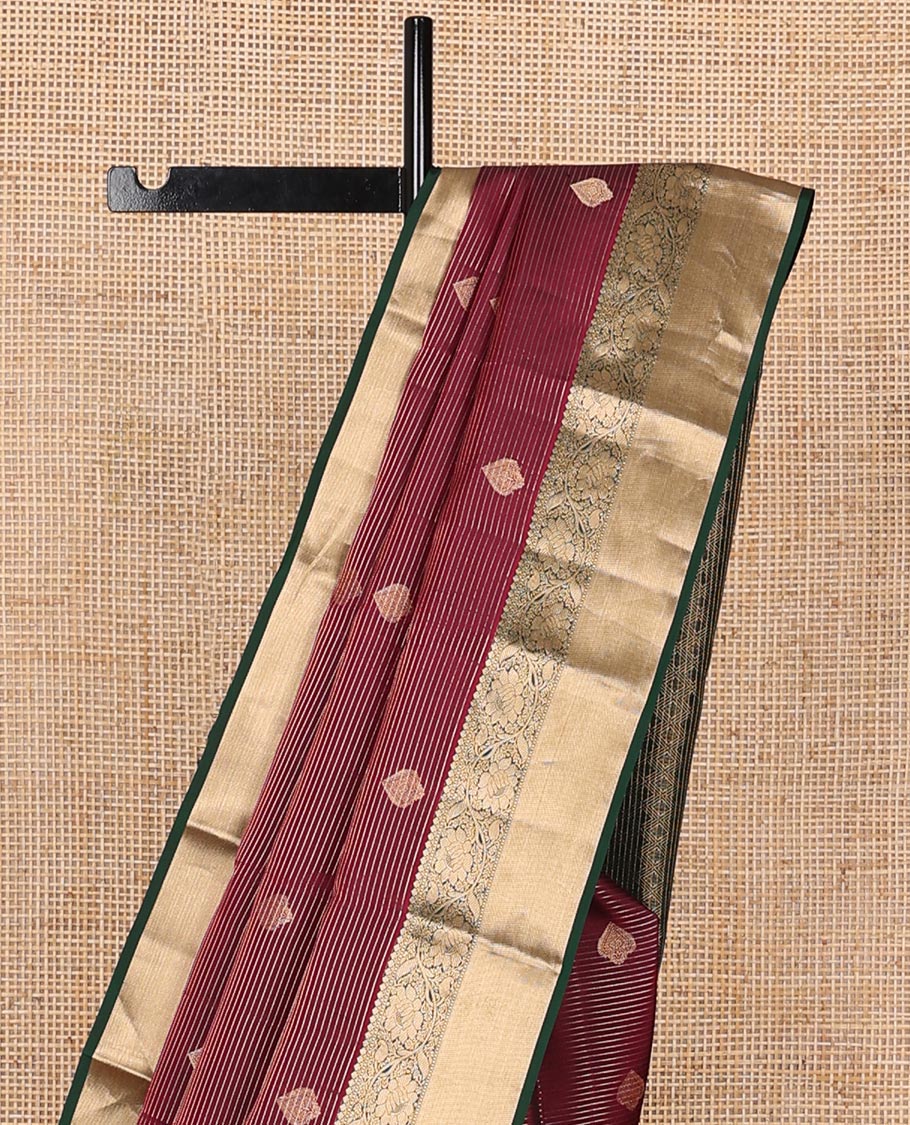 Maroon zari design silk saree, contrast border of thilakam mokku,muthu & kodi visiry design & jaal pallu
