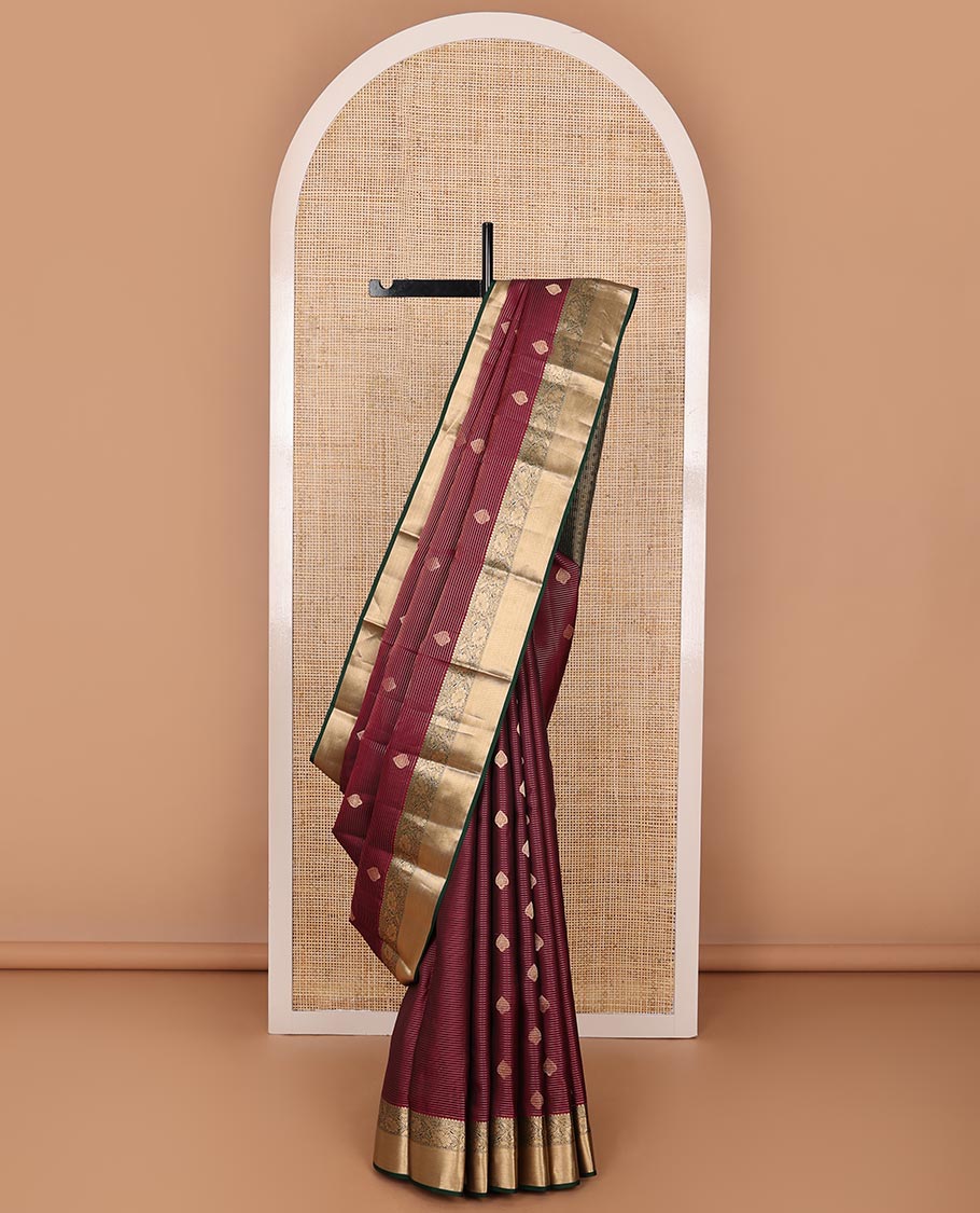 Maroon zari design silk saree, contrast border of thilakam mokku,muthu & kodi visiry design & jaal pallu
