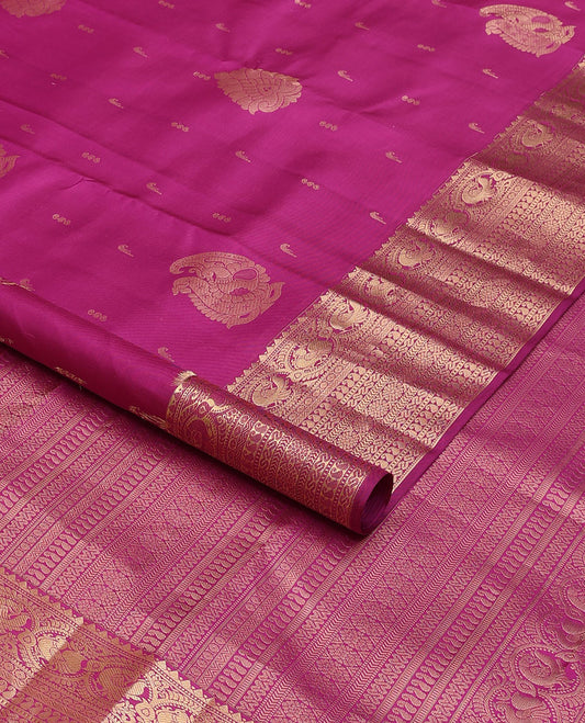 Rani pink silk saree with mayil & muniya buttas, zari border & pallu of thilakam,muthu,kathir,mayil,rettai neli,manga,kamalam & cross neli