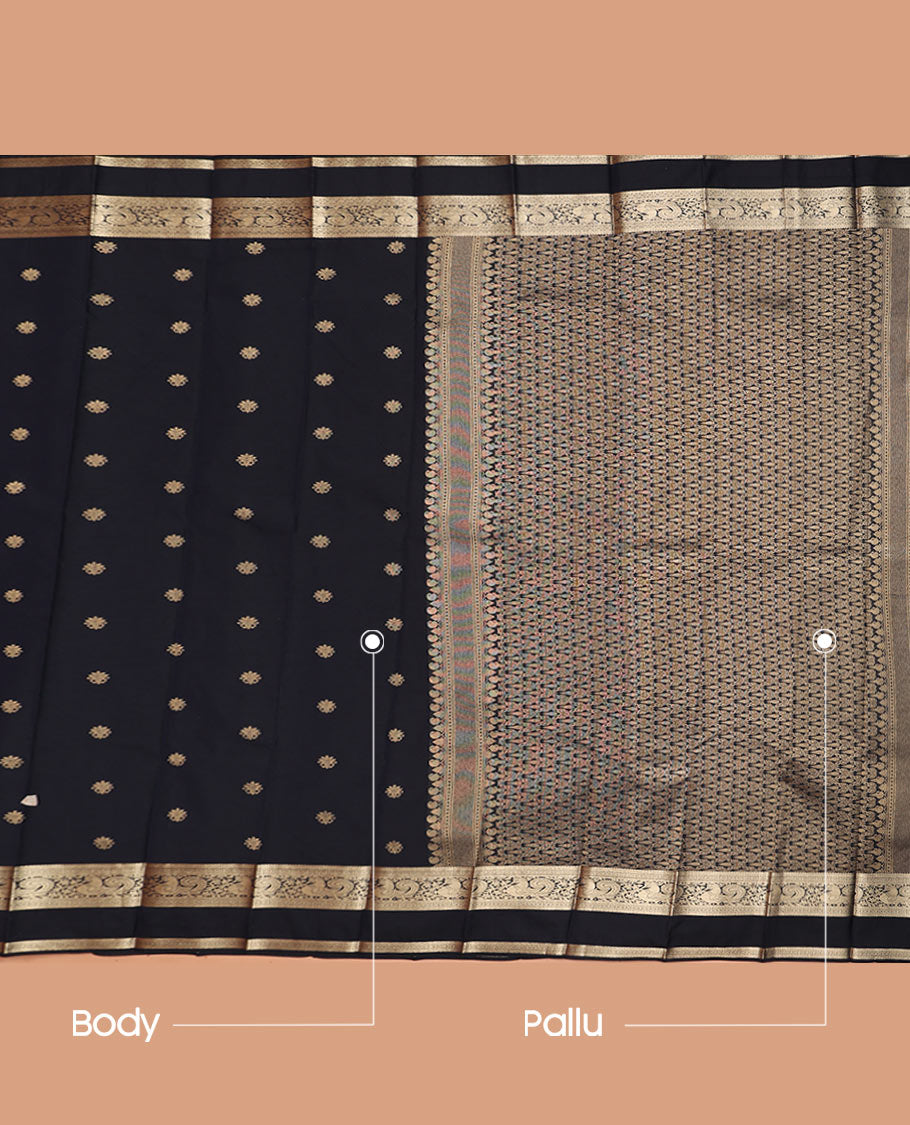 Inky Black Budget Silk Saree Richly Detailed with Zari Buttas, Featuring a Traditional Zari-Design Rettai Pettu Border, Self-Colored Pallu Ofintricate Designs, and a Matching Blouse