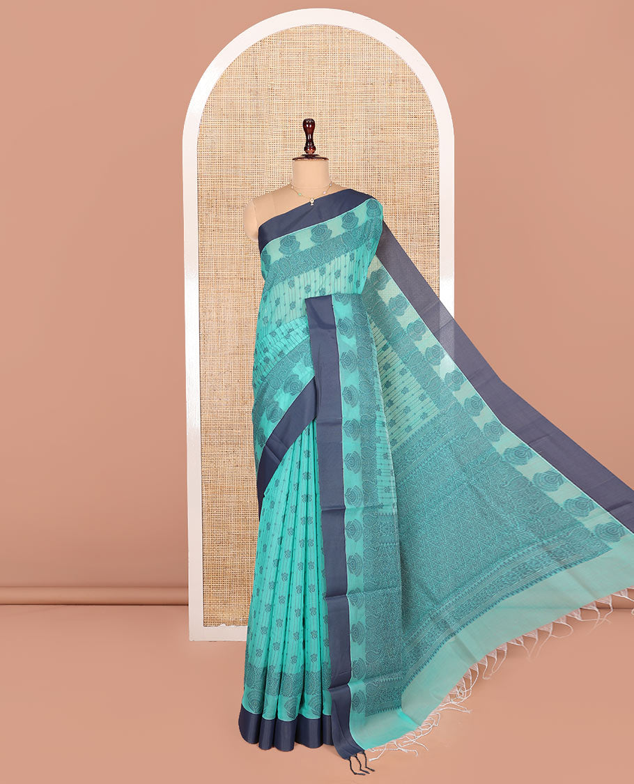 Green Semi-Silk Cotton Saree, Subtly Sparkled with Stripes and Buttas All Over Its Body, Complemented by Contrast Border, Intricately Designed Pallu, and Paired with a Matching Blouse