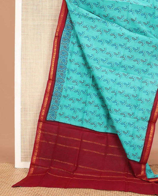 Blue paisleys printed Sungudi cotton saree, contrast zari border & zari striped pallu