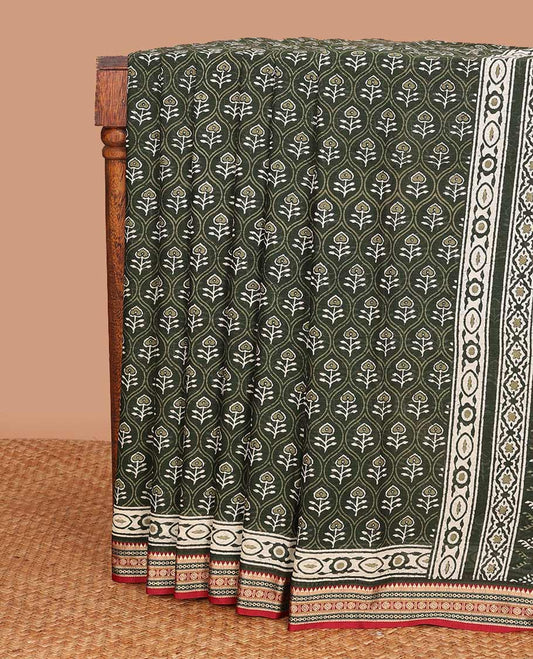 Green ogee patterns printed mul mul cotton saree, contrast traditional thread border, and geometric printed pallu