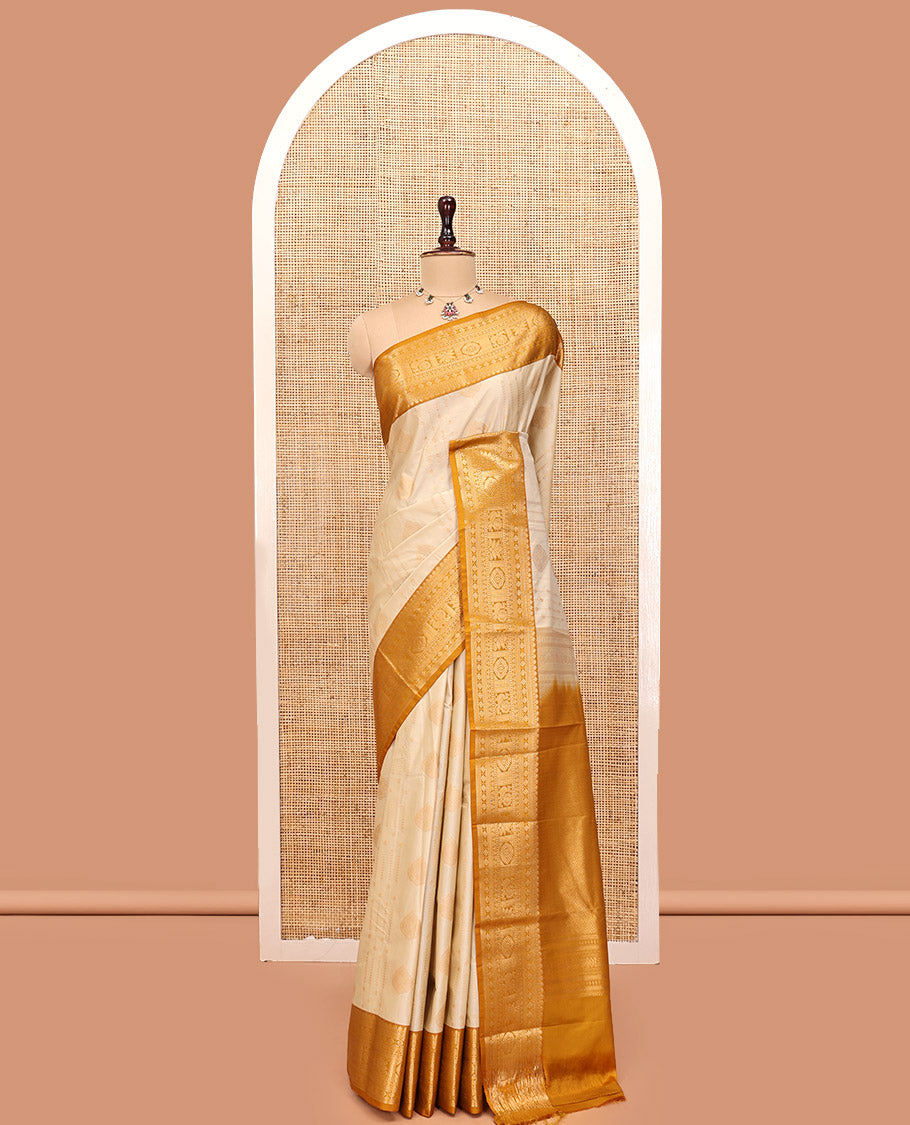 Biscuit-Yellow Budget Silk Saree, Woven with Zari Buttas, Complemented by a Contrast Traditional Zari Border, Grand Jaal Pallu, and a Contrast Blouse