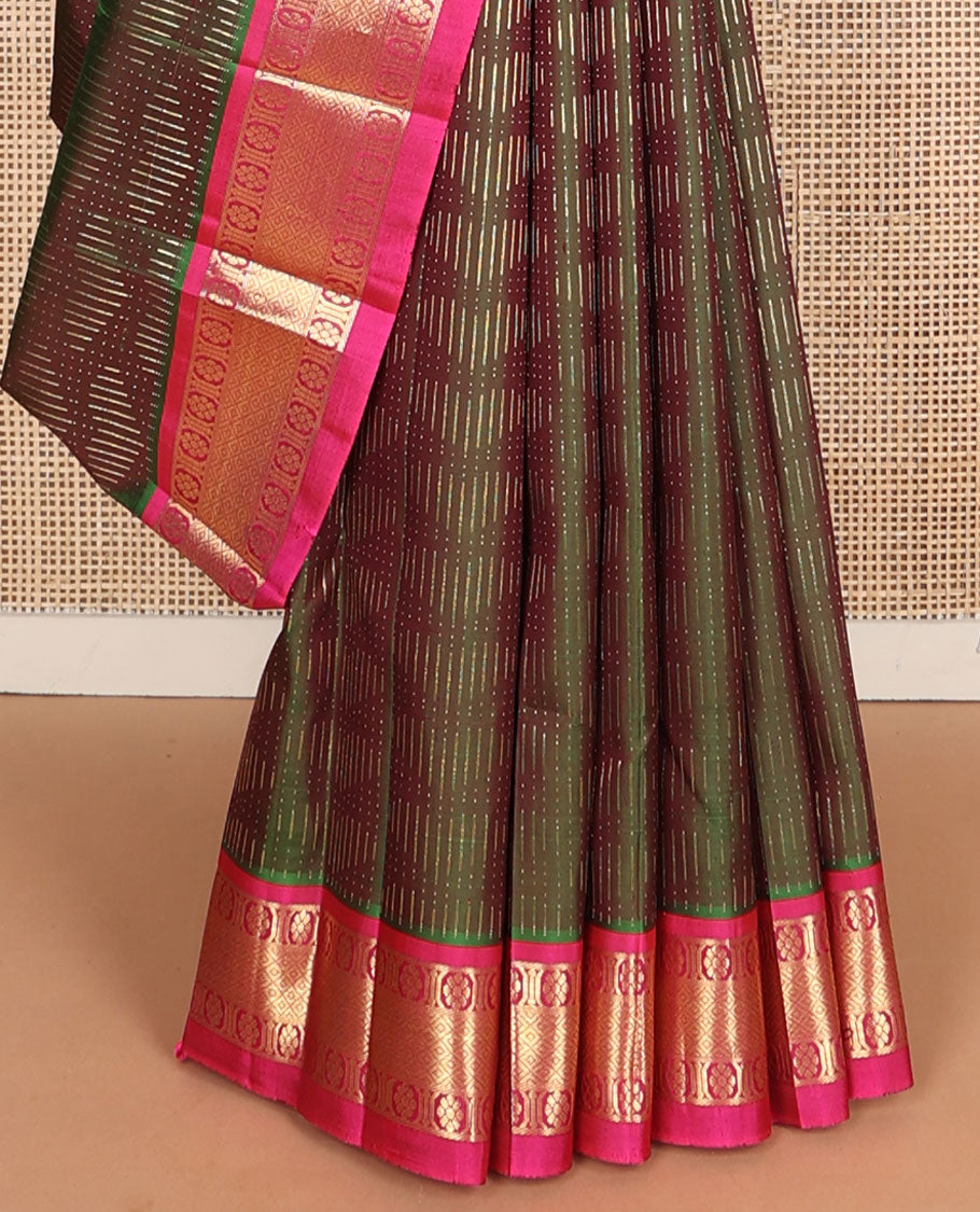 Green dual-tone zari buttas Kanchipuram silksaree, contrast one-sided border of kamalam & mayil kann design & intricate pallu