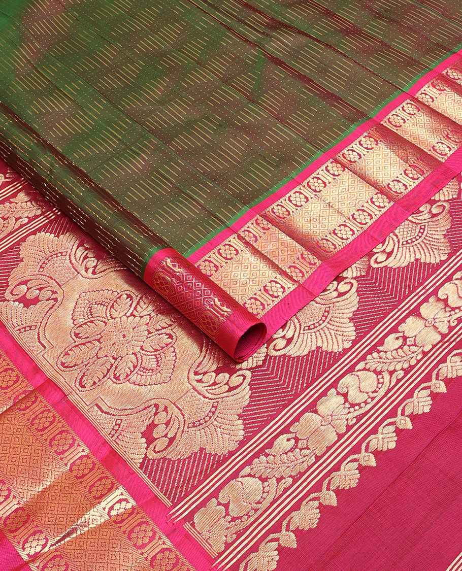 Green dual-tone zari buttas Kanchipuram silksaree, contrast one-sided border of kamalam & mayil kann design & intricate pallu