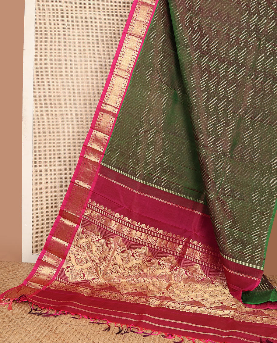 Green dual-tone zari buttas Kanchipuram silksaree, contrast one-sided border of kamalam & mayil kann design & intricate pallu