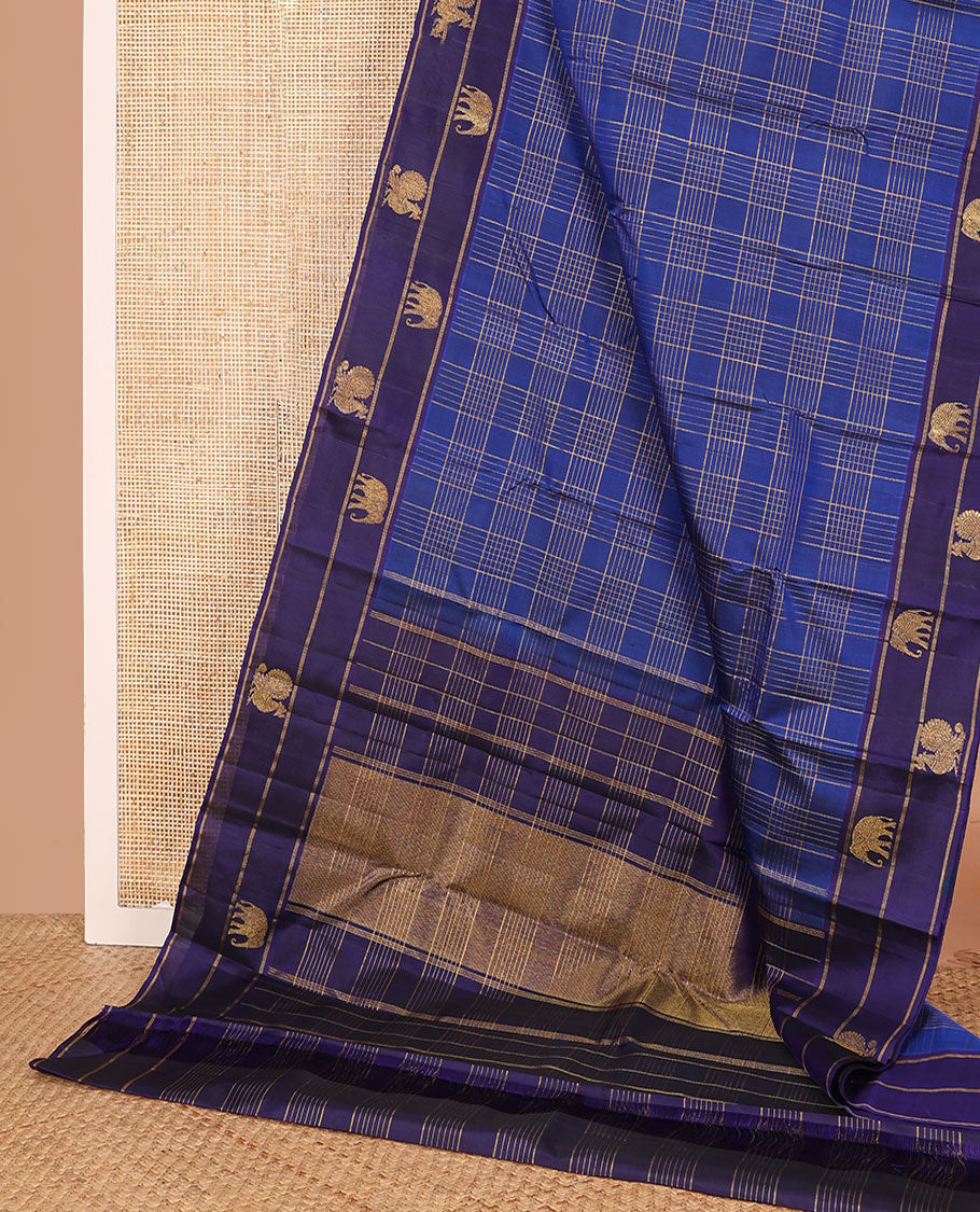 Blue zari checked Kanchipuram silk saree, contrast border of yaanai, and mayil designs, and zari design pallu