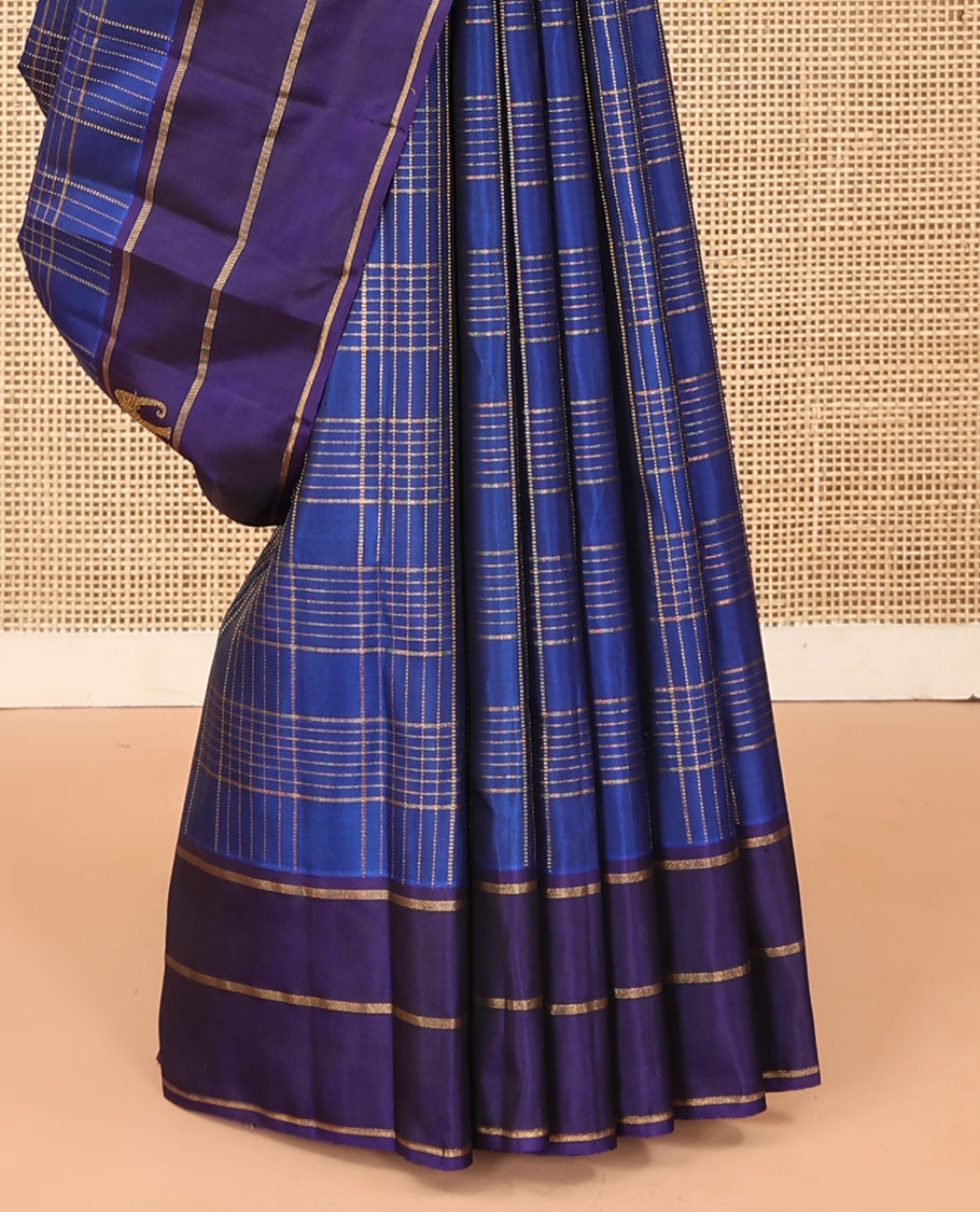 Blue zari checked Kanchipuram silk saree, contrast border of yaanai, and mayil designs, and zari design pallu