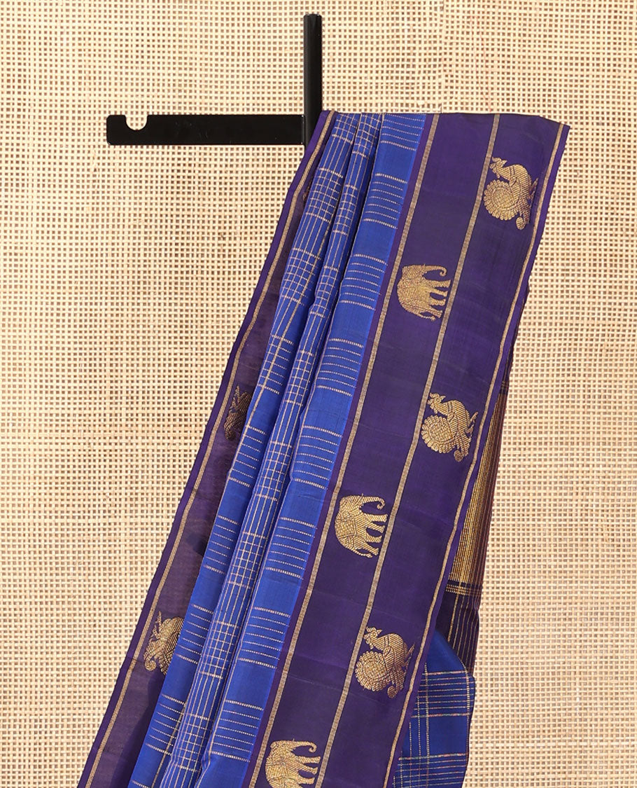 Blue zari checked Kanchipuram silk saree, contrast border of yaanai, and mayil designs, and zari design pallu