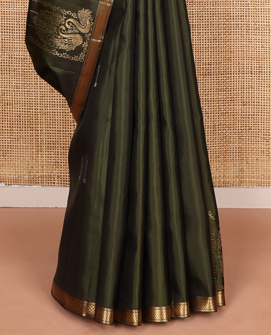 Green mayil buttas soft silk saree, zari piping border, and pallu of intricate designs
