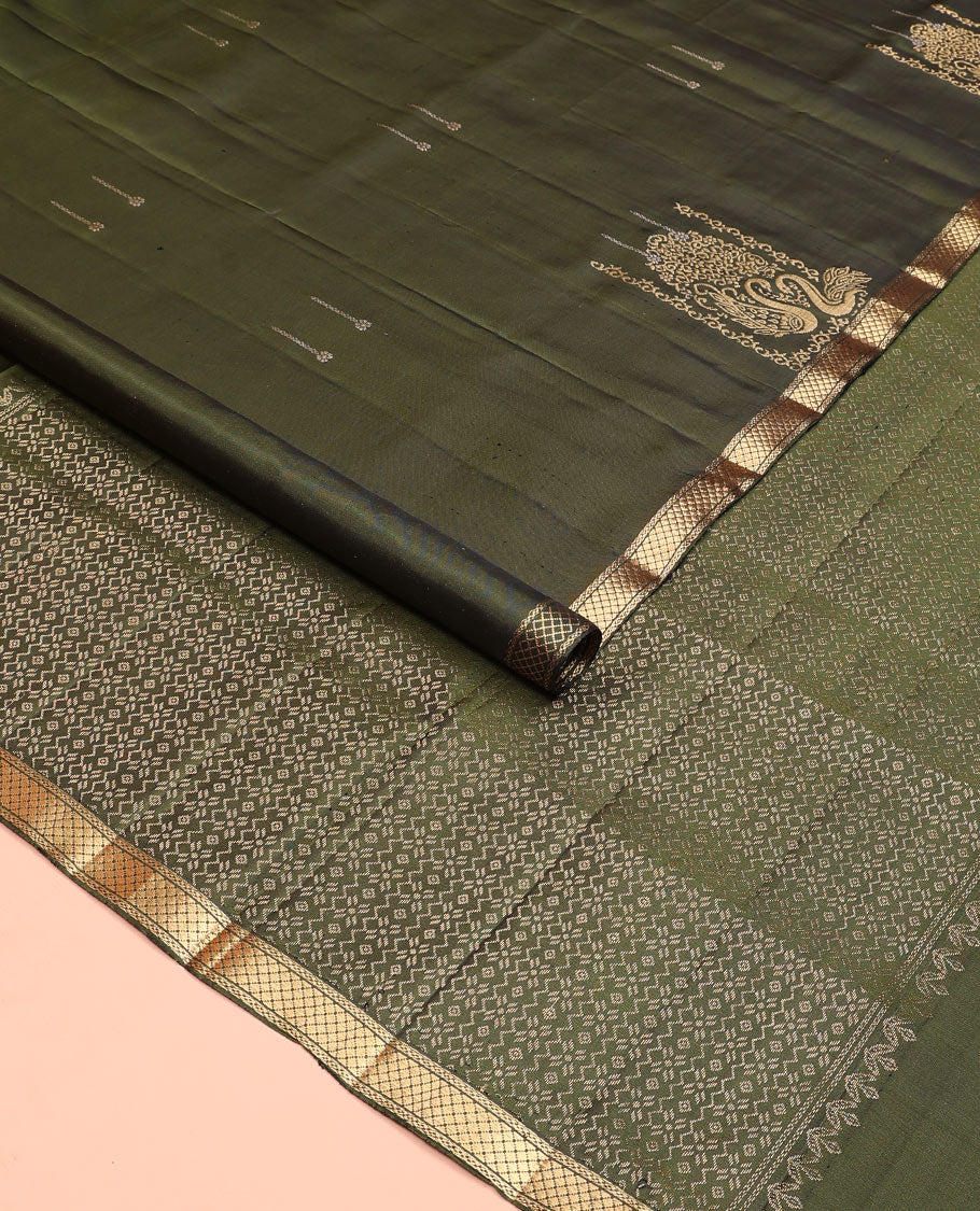 Green mayil buttas soft silk saree, zari piping border, and pallu of intricate designs