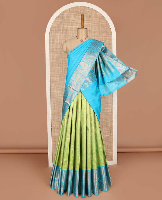 Green pure-silk half saree, jacquard with contrast traditional zari bordered skirt, blouse of thilakam mokku,poun, vanki, and thilakam designs , and zari design dhavani