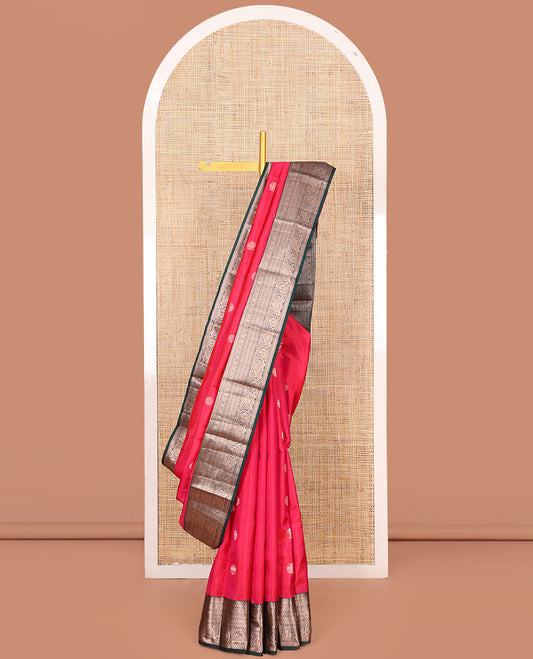 Red Vasundhara Silk Saree Accentuated with Zari Buttas All Over Its Body, Highlighted with a Contrast Border of Traditional Zari Designs, Pallu Delicately Woven with Jaal Designs, and Paired with a Contrast Blouse