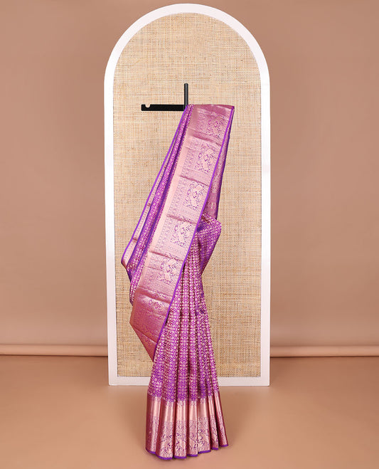 Purple jacquard kancheepuram silk saree with self border of intricate zari design & floral design pallu