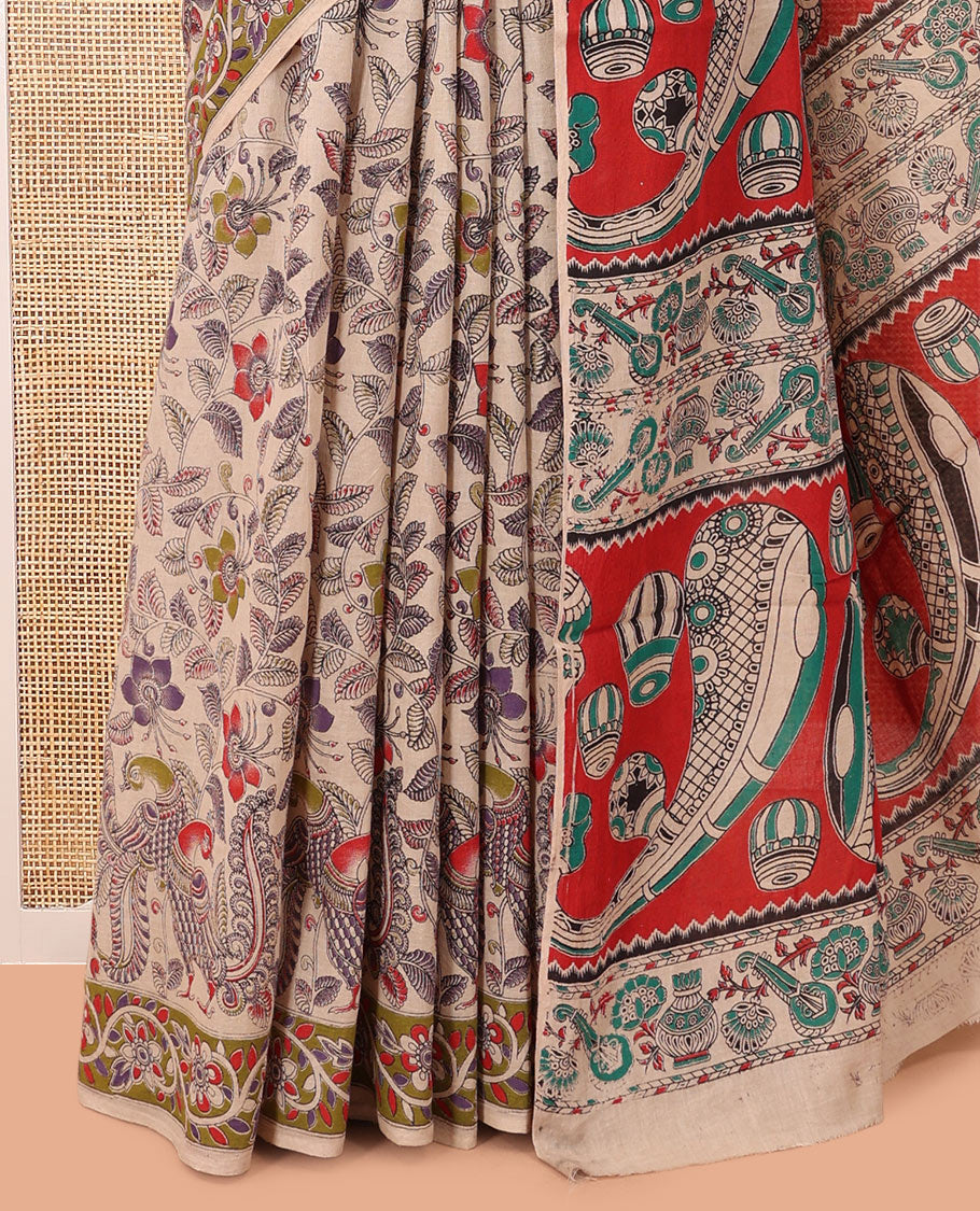 Multi-Color Kalamkari Cotton Saree, Adorned with Floral Vine Print, Contrast Printed Border, Pallu of Paisley and Music Instument Motifs, and a Matching Blouse