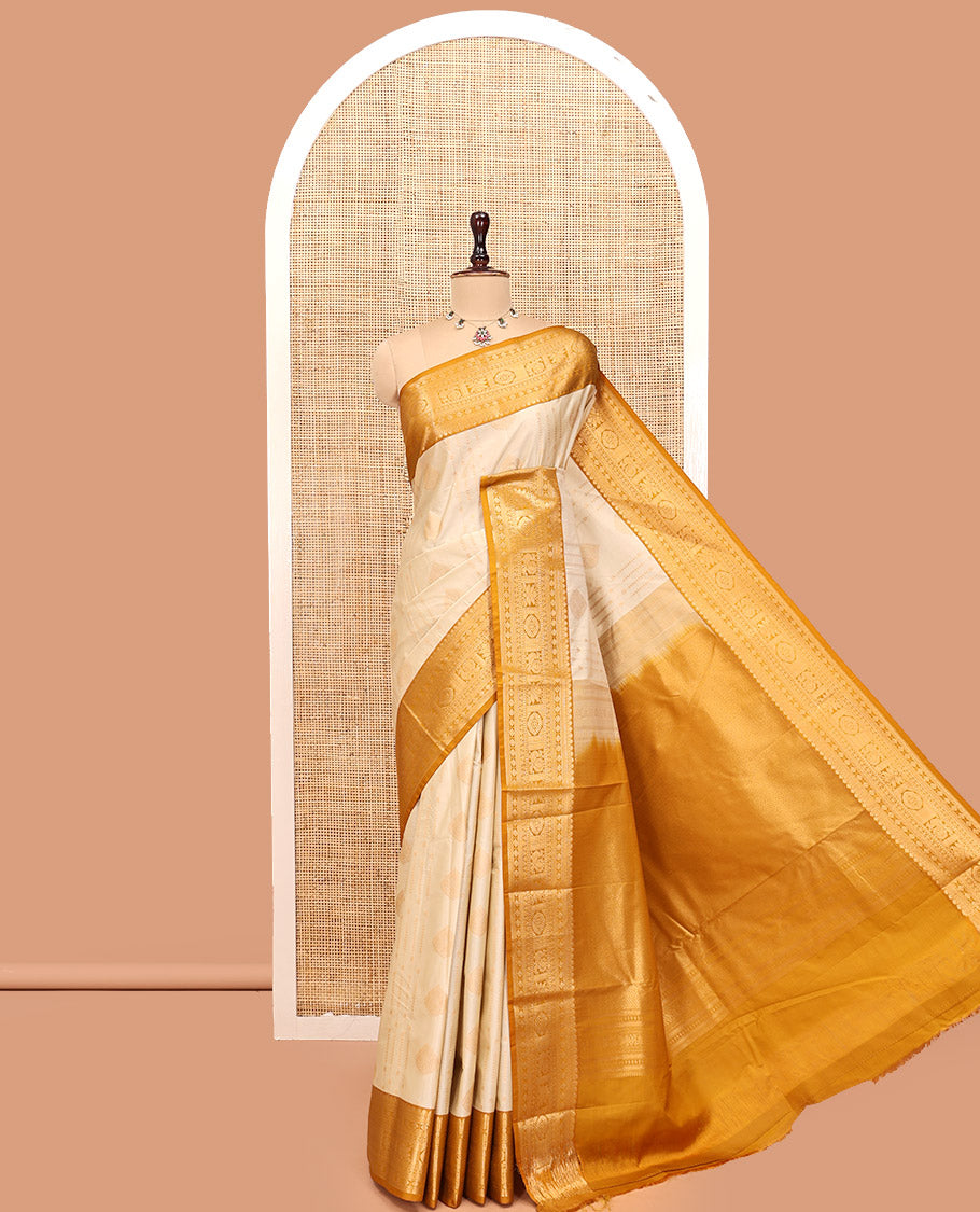 Biscuit-Yellow Budget Silk Saree, Woven with Zari Buttas, Complemented by a Contrast Traditional Zari Border, Grand Jaal Pallu, and a Contrast Blouse