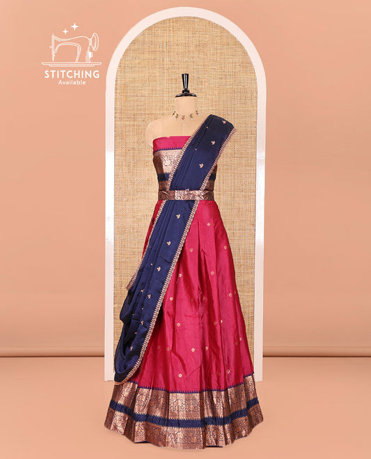 Pink-Blue Semi-Banarasi Half-Saree Subtly Sparkled with Zari Buttas on Its Skirt, Complemented by a Contrast Traditional Zari Temple Rettai Pettu Border, Paired with a Matching Blouse, and a Satin Georgette Embroidered Scallop Dhavani