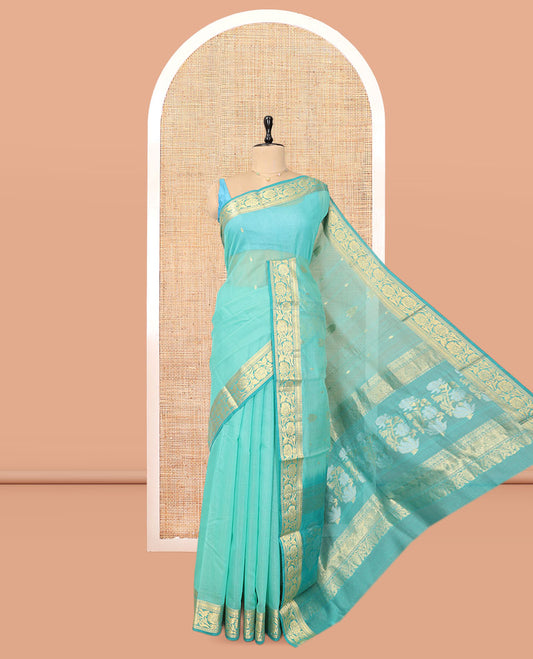 Turquoise Silk Cotton Saree, Sparsely Woven with Zari Buttas, Contrast Floral Creeper Border, Intricate Pallu, and a Contrast Blouse