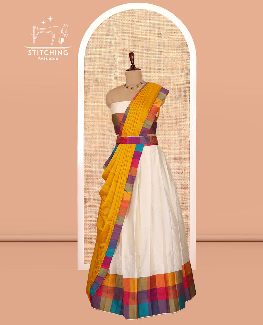 Cream-Mustard Semi- Silk Plain Half-Saree, Contrast Madras Checked Border, Matching Blouse and a Contrast Syska Georgette Dhavani