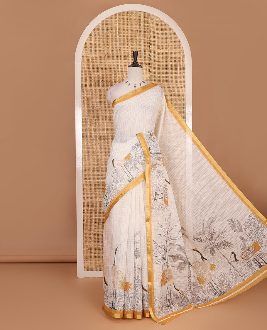 White with mustard zari checks linen saree with contrast border and unique designs of pallu along with contrast plain blouse