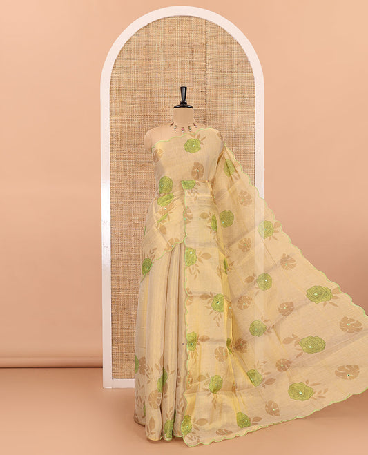 Gold and green rose motifs printed with mirror work tissue saree, scallop embroidered border, printed pallu, and a contrast blouse