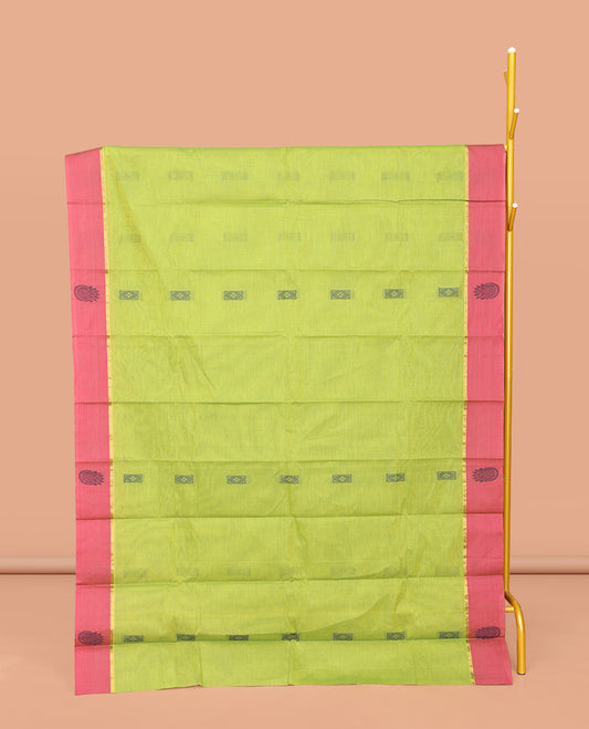 Leaf Green Kanchi Cotton Saree, Crafted with Buttas All Over Its Body, Complemented by Contrast Border, Pallu of Floral Designs, and Paired with a Matching Blouse