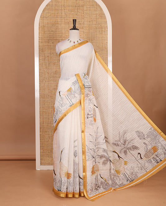 White with mustard zari checks linen saree with contrast border and unique designs of pallu along with contrast plain blouse