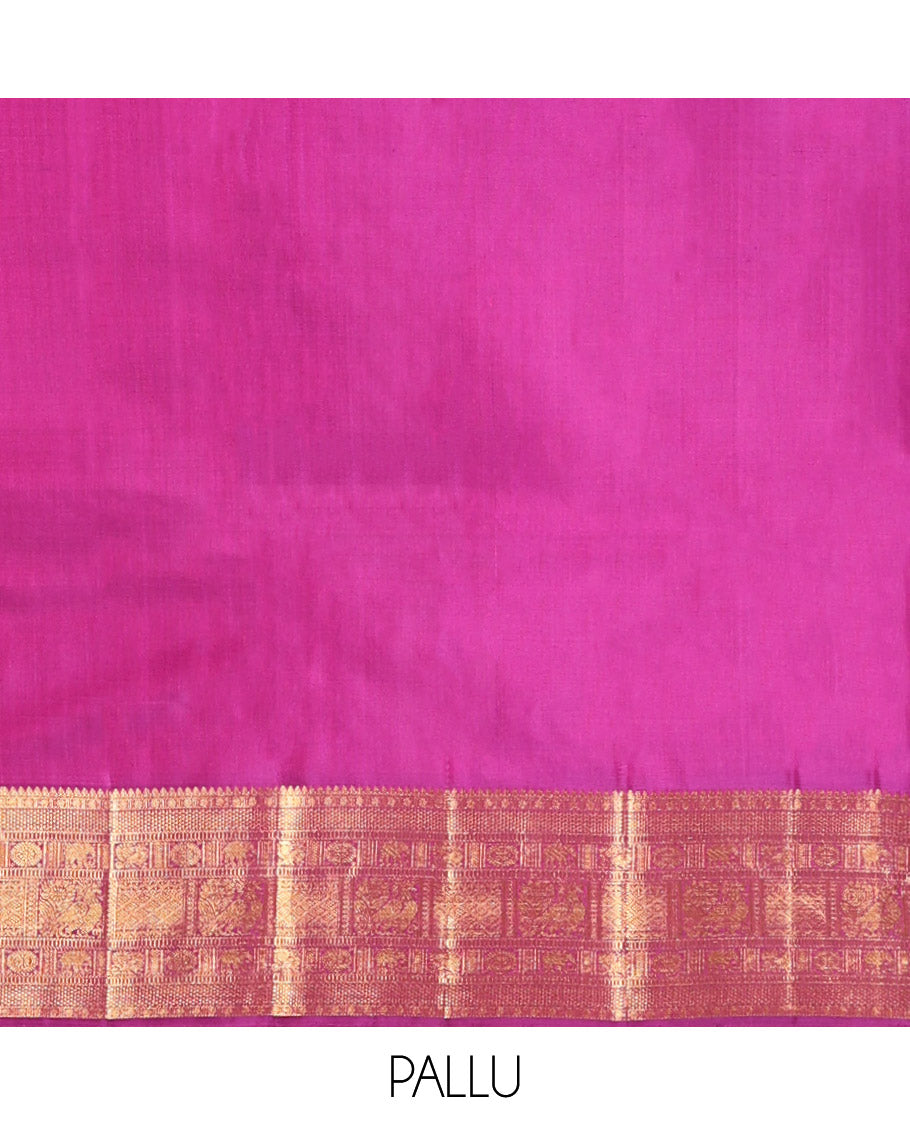 Orange Kanchipuram Silk Saree, Gracefully Embellished with Mayil Buttas, Complemented by a Contrast Border of Thilakam Mokku, Rudaraksham, Mayil Kann, Chakram, Yaanai, Mayil, and Jaal Designs, Pallu of Zari Designs, and Paired with a Contrast Blouse