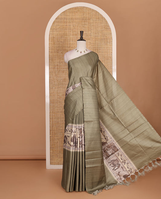 Borderless Green dobby style buttas and animal motifs printed semi tussar saree, contrast digital printed blouse