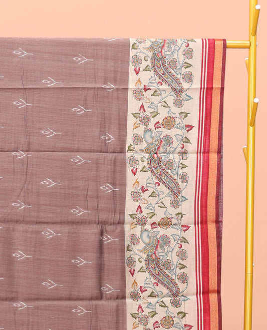 Brown Kanchi Cotton Saree, Adorned with Buttas All Over Its Body, Complemented by a Contrast Border of Kalamkari Peacock Print, Pallu of Kalamkari Peacock Print, and Paired with a Contrast Blouse
