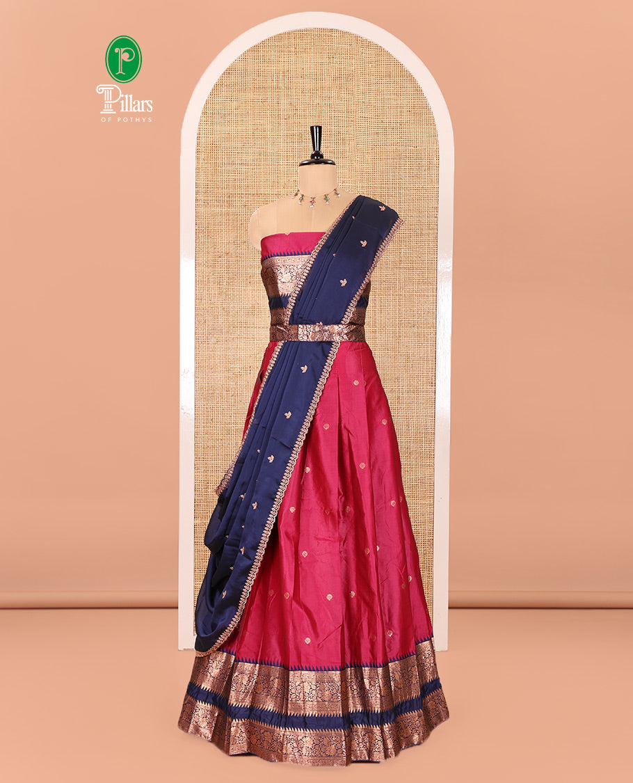 Pink-Blue Semi-Banarasi Half-Saree Subtly Sparkled with Zari Buttas on Its Skirt, Complemented by a Contrast Traditional Zari Temple Rettai Pettu Border, Paired with a Matching Blouse, and a Satin Georgette Embroidered Scallop Dhavani