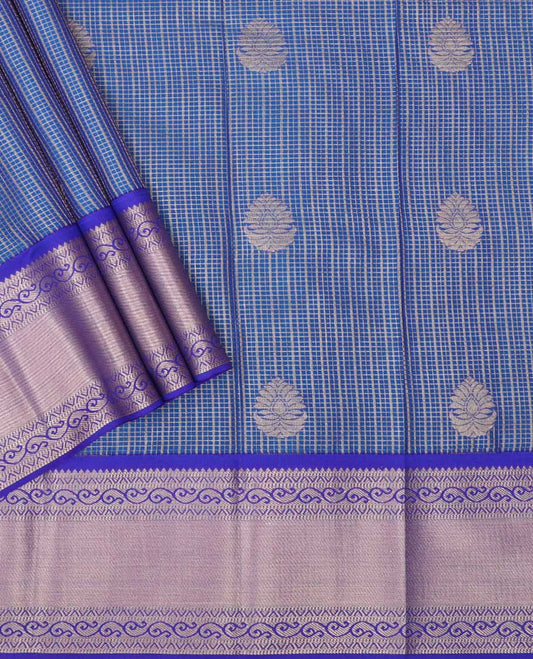 Dark blue checked, floral design art silk pavadai material with contrast zari design border & zari design blouse