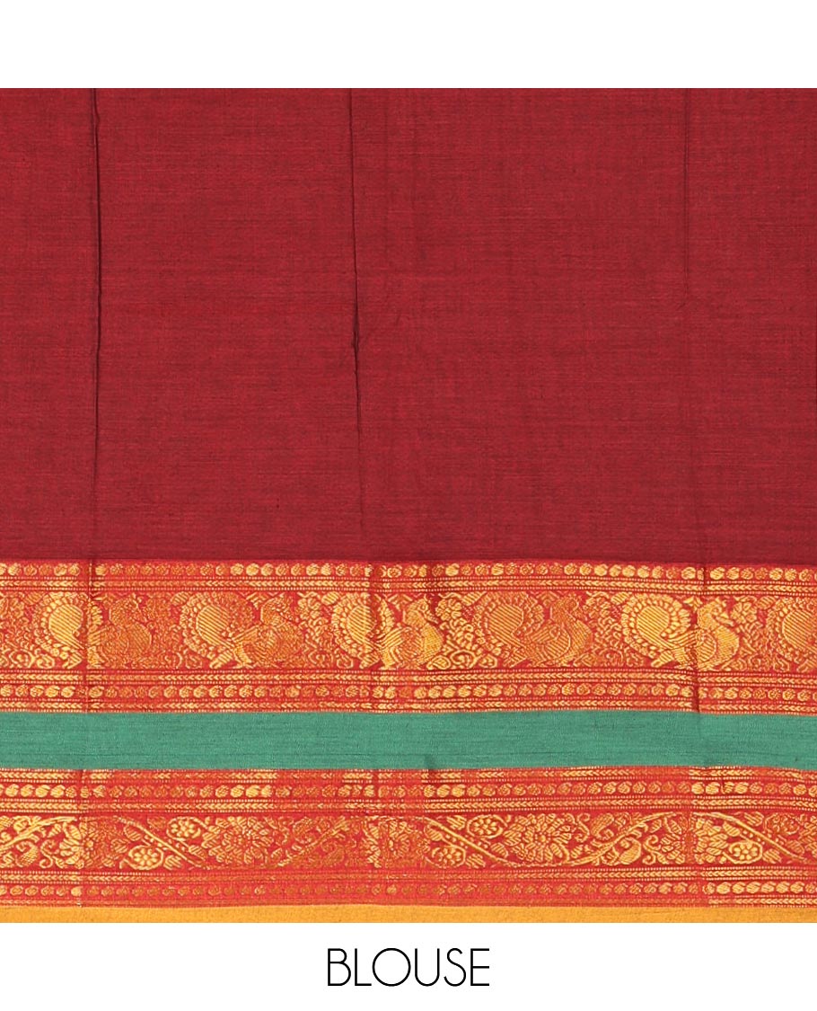 Maroon Plain Mercerised Cotton Saree Artfully Detailed with a Contrasting Rettai Pettu Border Featuring Peacock Motifs in Zari, a Subtly Striped Pallu, and a Matching Blouse