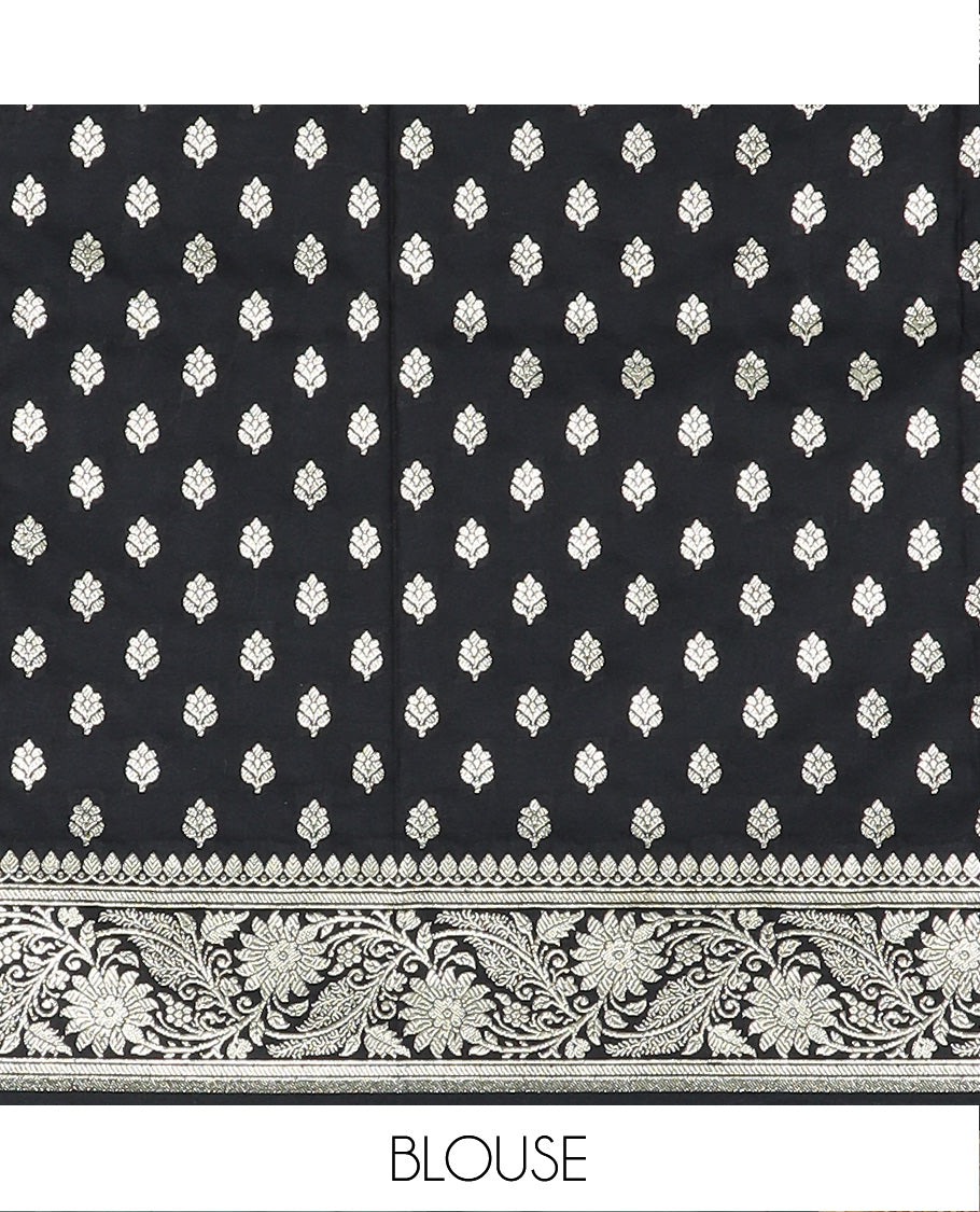 Inky Black Semi-Banaras Satin Saree, Subtly Sparkled Border of Floral Creeper Designs, Pallu Beautified with Thilak Motifs in Zari, and Paired with a Matching Blouse