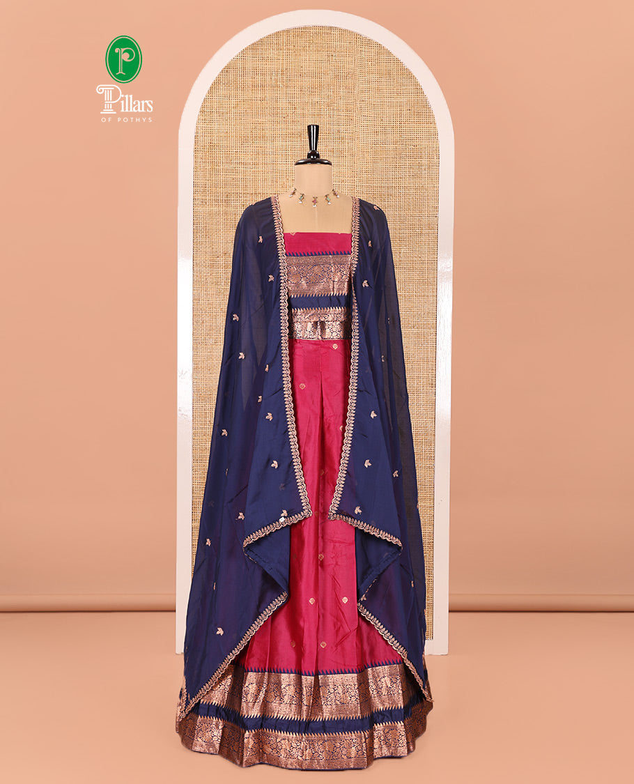 Pink-Blue Semi-Banarasi Half-Saree Subtly Sparkled with Zari Buttas on Its Skirt, Complemented by a Contrast Traditional Zari Temple Rettai Pettu Border, Paired with a Matching Blouse, and a Satin Georgette Embroidered Scallop Dhavani