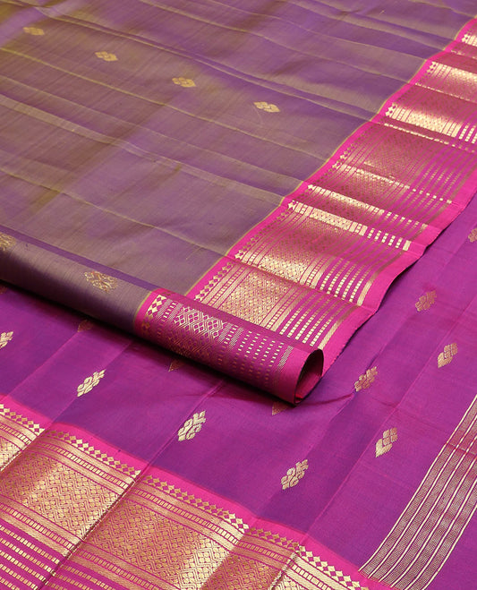 Purple zari buttas kanchipuram silksaree, contrast one-sided border of paneer sombu,banaras,muthu & jaal design & zari design pallu