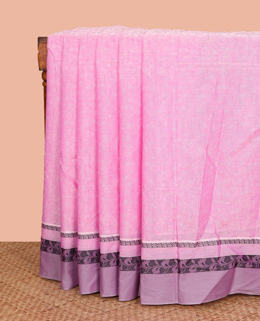 Pink Coimbatore Cotton Saree Features Sparsely Sparkled with Floral Print All Over Its Body, Complemented by Contrast Border of Floral Creeper Designs, Pallu Steeped with Floral Patterns, and Is Paired with a Plain Matching Blouse