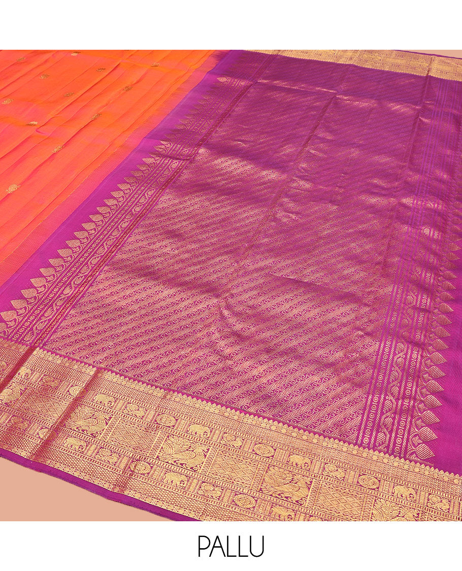 Orange Kanchipuram Silk Saree, Gracefully Embellished with Mayil Buttas, Complemented by a Contrast Border of Thilakam Mokku, Rudaraksham, Mayil Kann, Chakram, Yaanai, Mayil, and Jaal Designs, Pallu of Zari Designs, and Paired with a Contrast Blouse