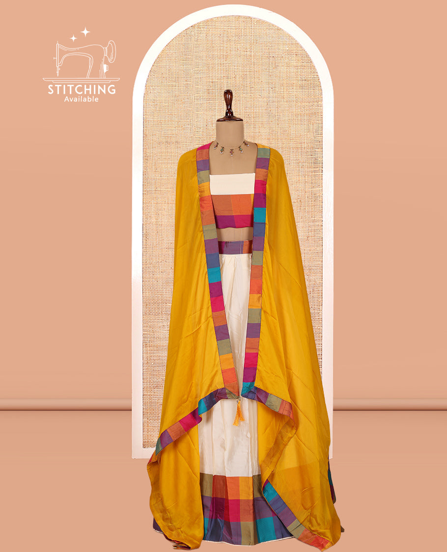 Cream-Mustard Semi- Silk Plain Half-Saree, Contrast Madras Checked Border, Matching Blouse and a Contrast Syska Georgette Dhavani