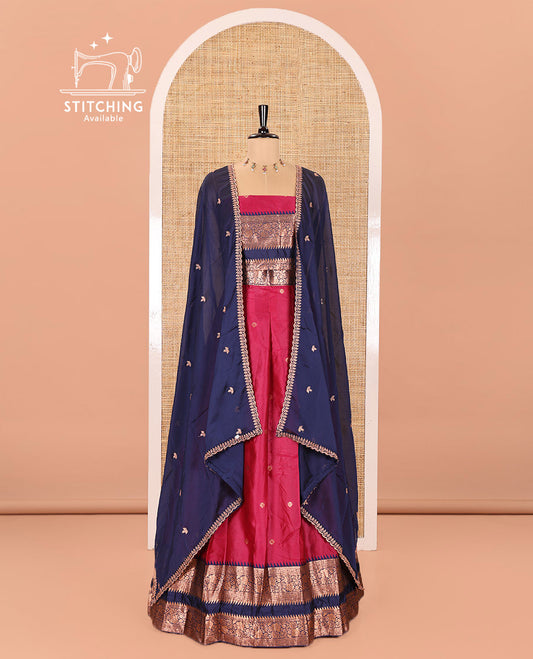 Pink-Blue Semi-Banarasi Half-Saree Subtly Sparkled with Zari Buttas on Its Skirt, Complemented by a Contrast Traditional Zari Temple Rettai Pettu Border, Paired with a Matching Blouse, and a Satin Georgette Embroidered Scallop Dhavani