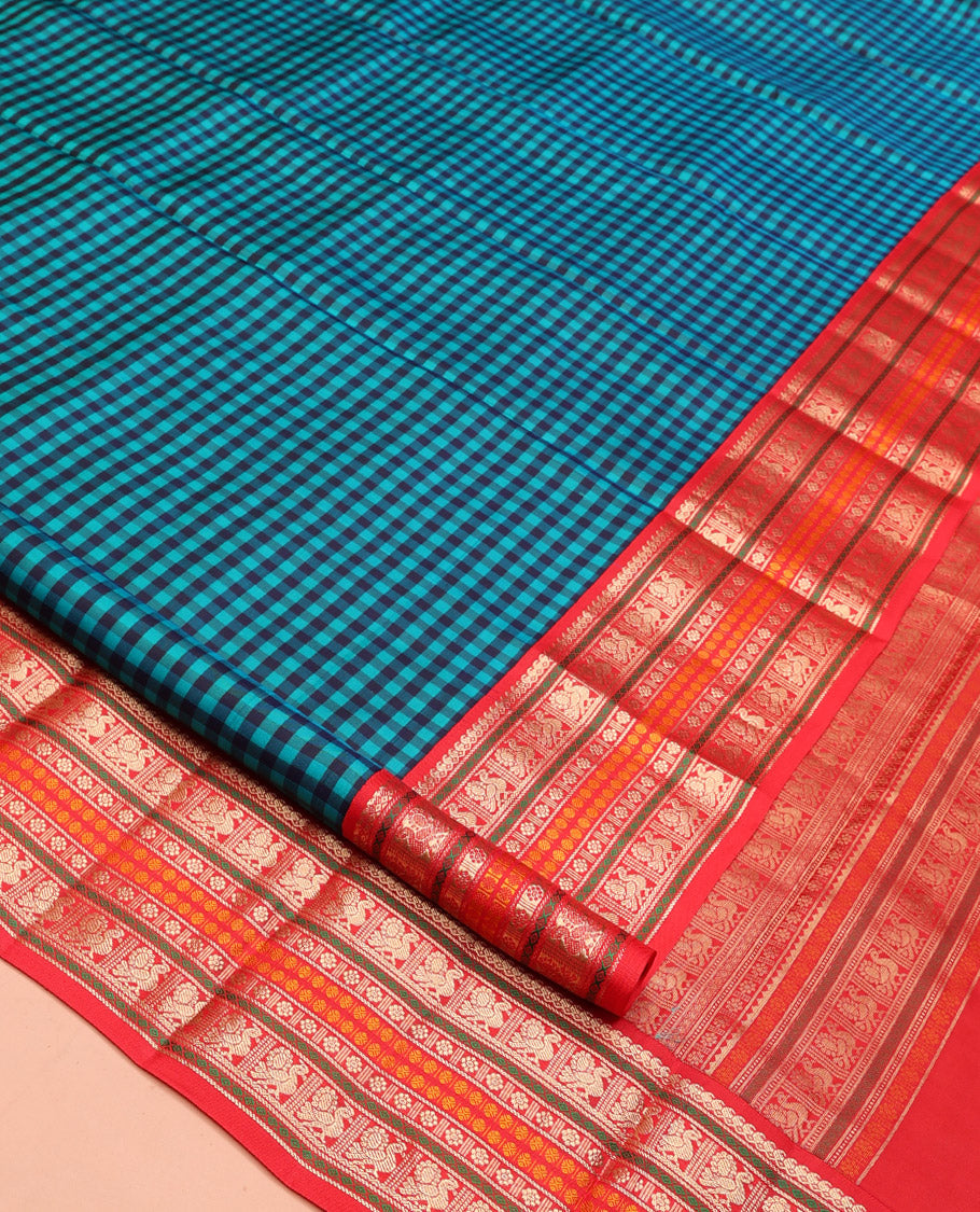 Blue Kanchipuram Silk Saree, Finely Crafted with Kasa-Kasa Checks, Contrast Border of Manga Mokku, Mayil, Poun and Kamalam, Pallu of Traditional Designs, and Contrast Blouse