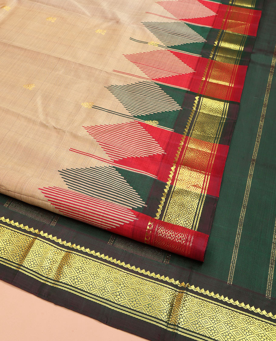 Sandal Kanchipuram Silk Saree, Elevated with Zari Buttas on Its Body, Complemented by a Contrast One-Sided Temple Border of Thilakam Mokku, and Jaal Designs, Pallu Depicts Zari Designs, and Comes Without a Blouse