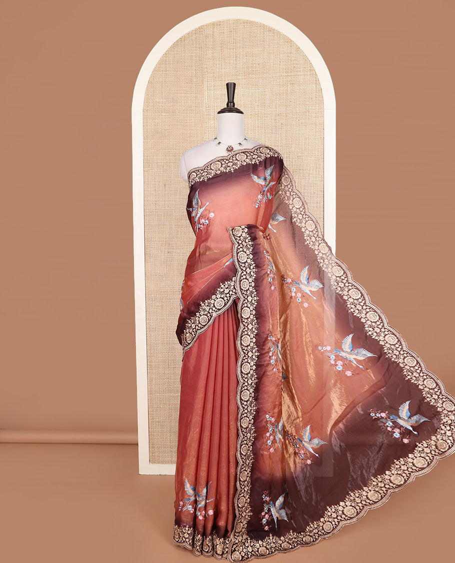 Orange crane and floral motifs thread embroidered designer saree, scallop floral thread embroidered border, and embroidered pallu