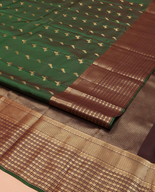 Green Vasundhara Lite Silk Mix Saree, Majestically Detailed with Zari Buttas on Its Body, Complemented by a Contrast Border of Rekku, Kathir, Rudraksham, and Ara Maadam Designs, Grand Geometric Patterned Pallu, and Paired with a Contrast Blouse