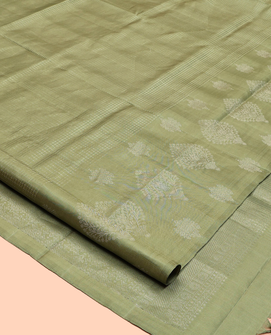 Green Mayuri Soft Silk Saree, Subtly Sparkled with Buttas, a Zari Border, Sparsely Woven Pallu, and a Matching Blouse