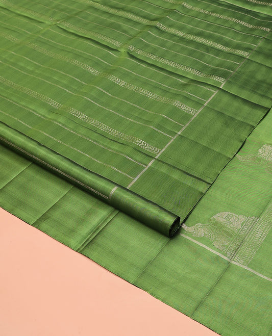 Green Mayuri Soft Silk Saree, Subtly Decked Up Zari Stripes All Over Its Body, Highlighted by Self-Border, Pallu Steeped with Elephant Motifs, and Paired with a Matching Blouse